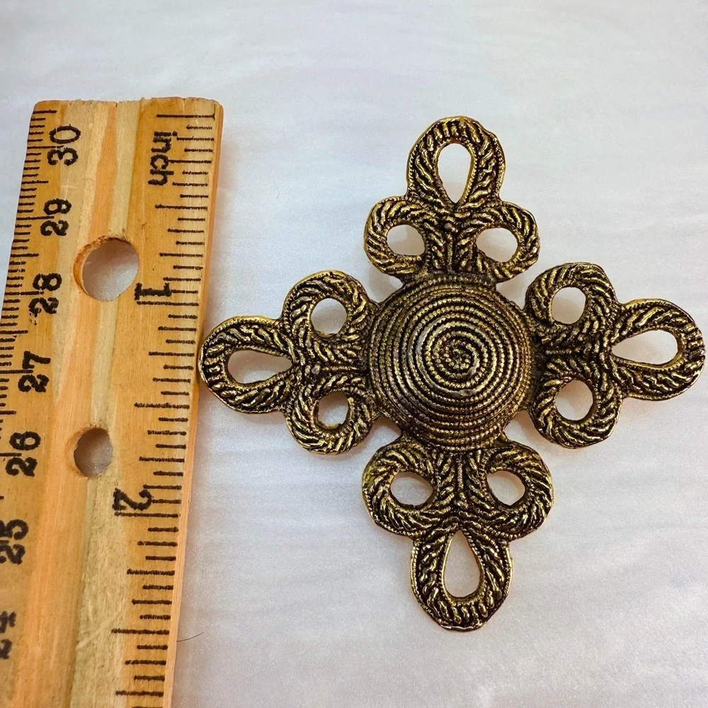 Aged brasstone vintage weighted brooch, pin